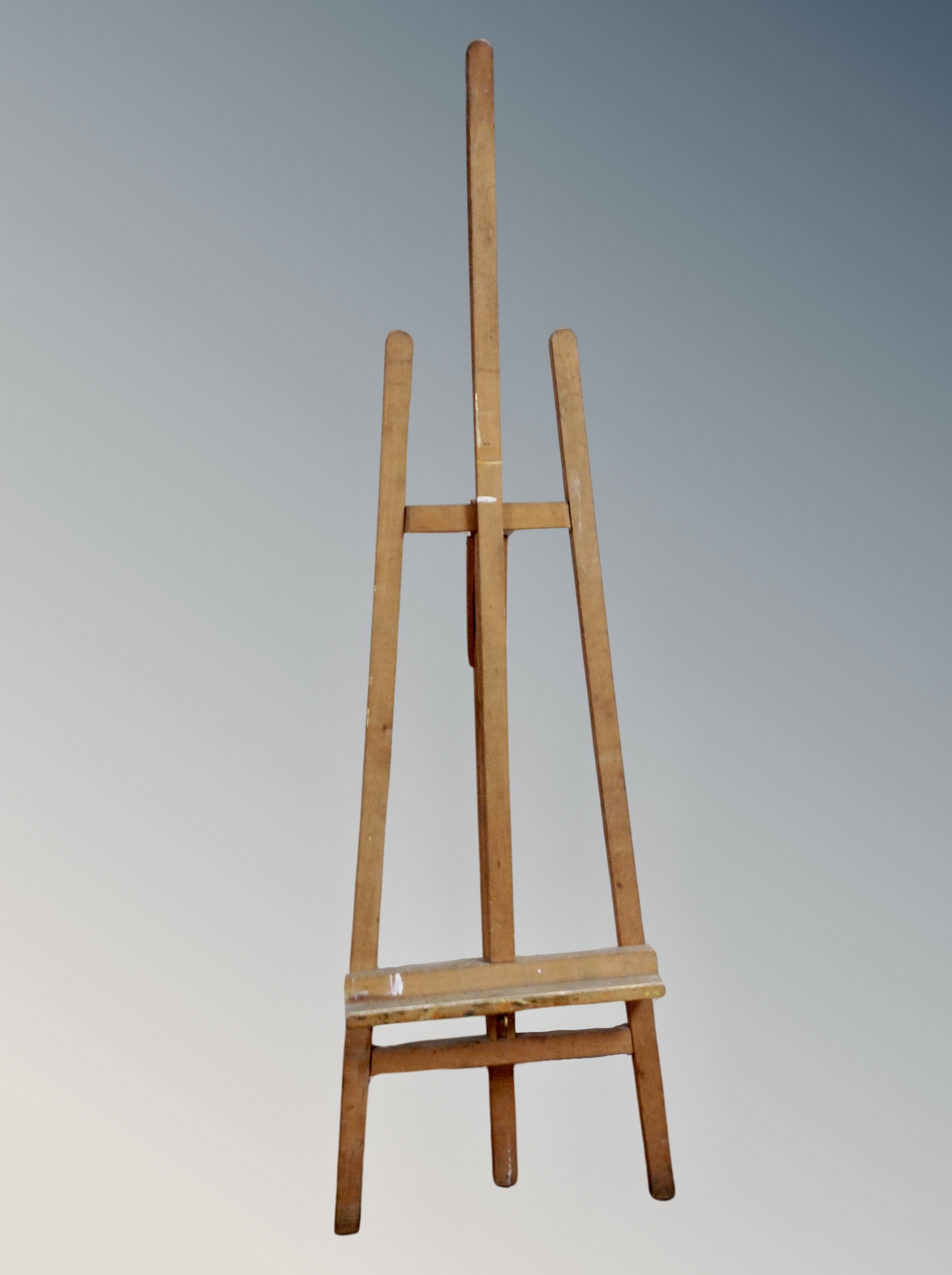 A folding wooden artist's easel