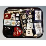 A tray of costume jewellery, wristwatches, bracelets, brooches,