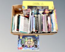 A box of books relating to web design and computing,
