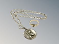 A 9ct gold ring and a silver St Christopher on chain CONDITION REPORT: Ring 1.8g.
