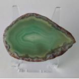 A green agate crystal slice from Brazil, 6cm by 4cm.