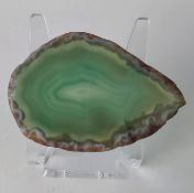 A green agate crystal slice from Brazil, 6cm by 4cm.