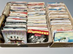 Two boxes of mid century and later vinyl seven inch singles, John Lennon, Sammy Davis Jnr, Queen,
