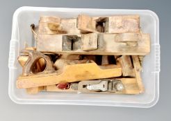 A box of assorted wood working planes
