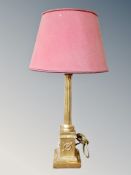 A gilt composite Corinthian column table lamp with shade,