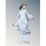 A Lladro china figure : Spring Splendor, model 5898, height 30ccm.