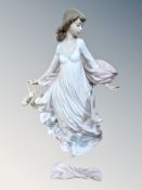 A Lladro china figure : Spring Splendor, model 5898, height 30ccm.