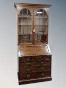 An oak Art Nouveau bureau bookcase