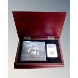 An El Cazador The Shipwreck that Changed the World coin and booklet in box