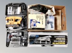 Boxed and cased power tools to include Performance rotary hammer drill, 4" cordless grinder,