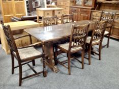 A Chapman's Siesta oak refectory dining table and six chairs