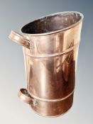 A Victorian cylindrical copper coal receiver with twin handles,