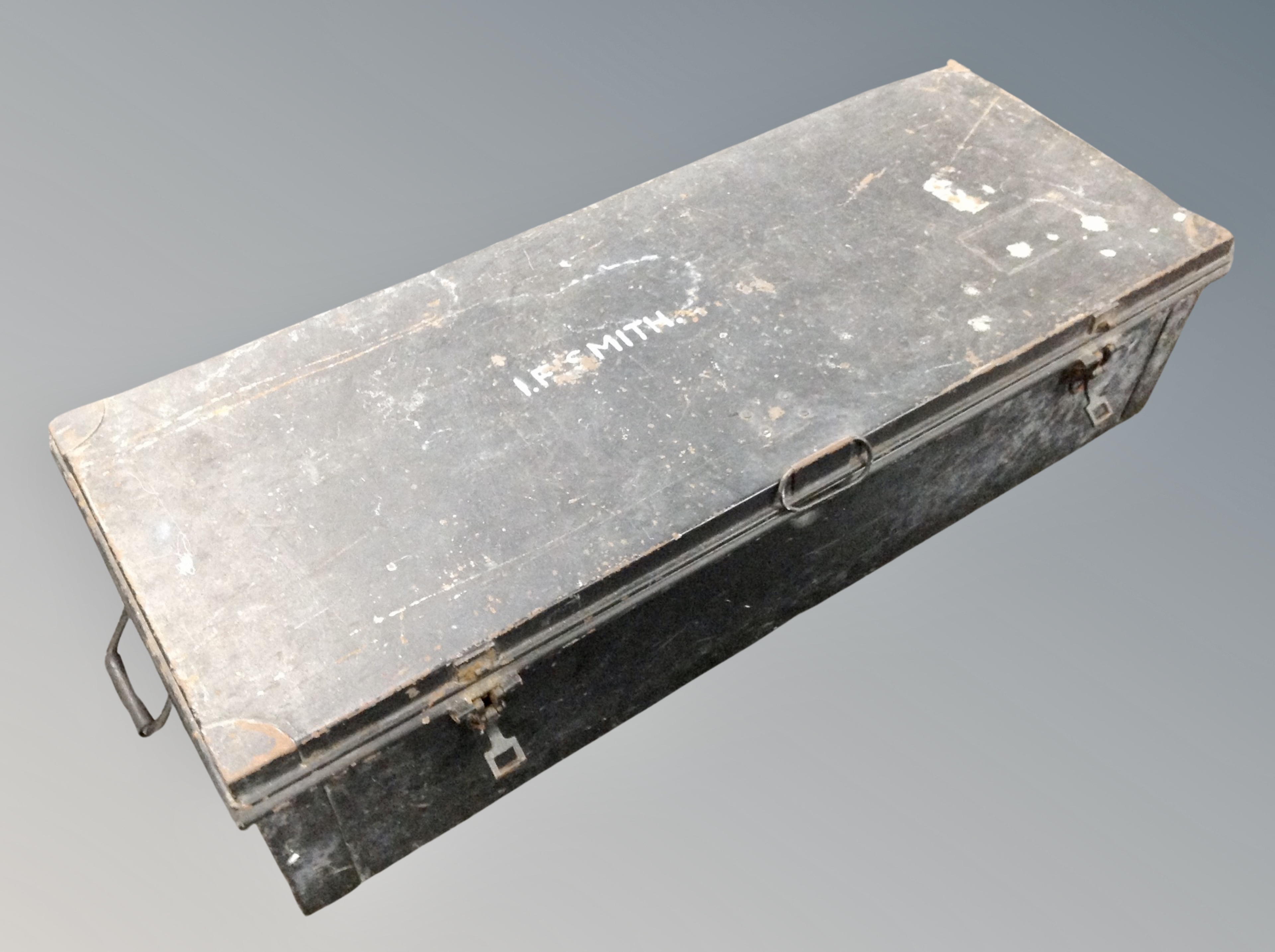 A military tin foot locker trunk,