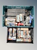 Two crates of fourteen vintage Scalextric racing cars, boxed, together with track,