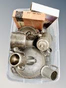 A box of cast iron lidded cooking pots, plated tea ware,