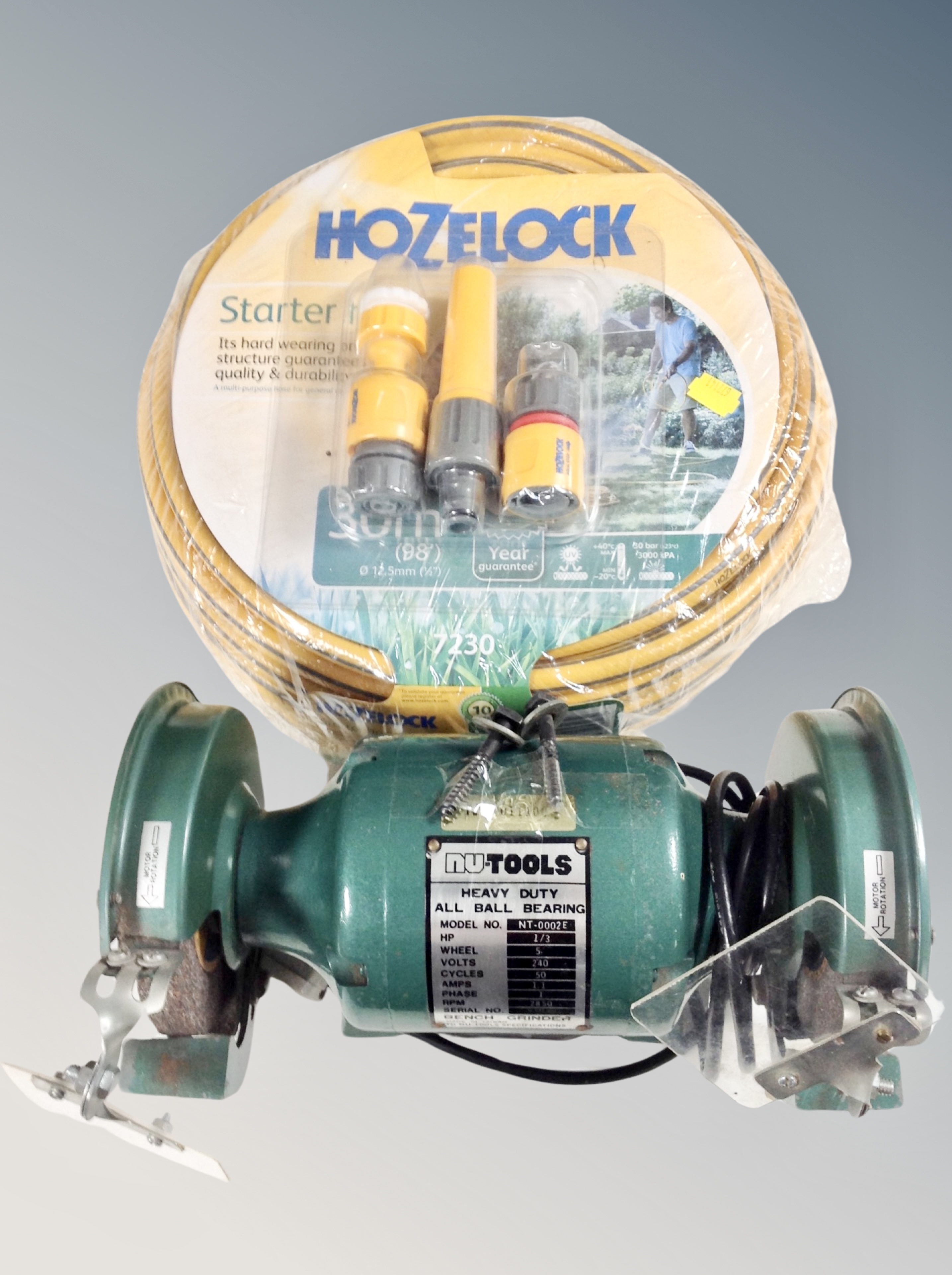 A Hozelock 30m hose with accessories (new),
