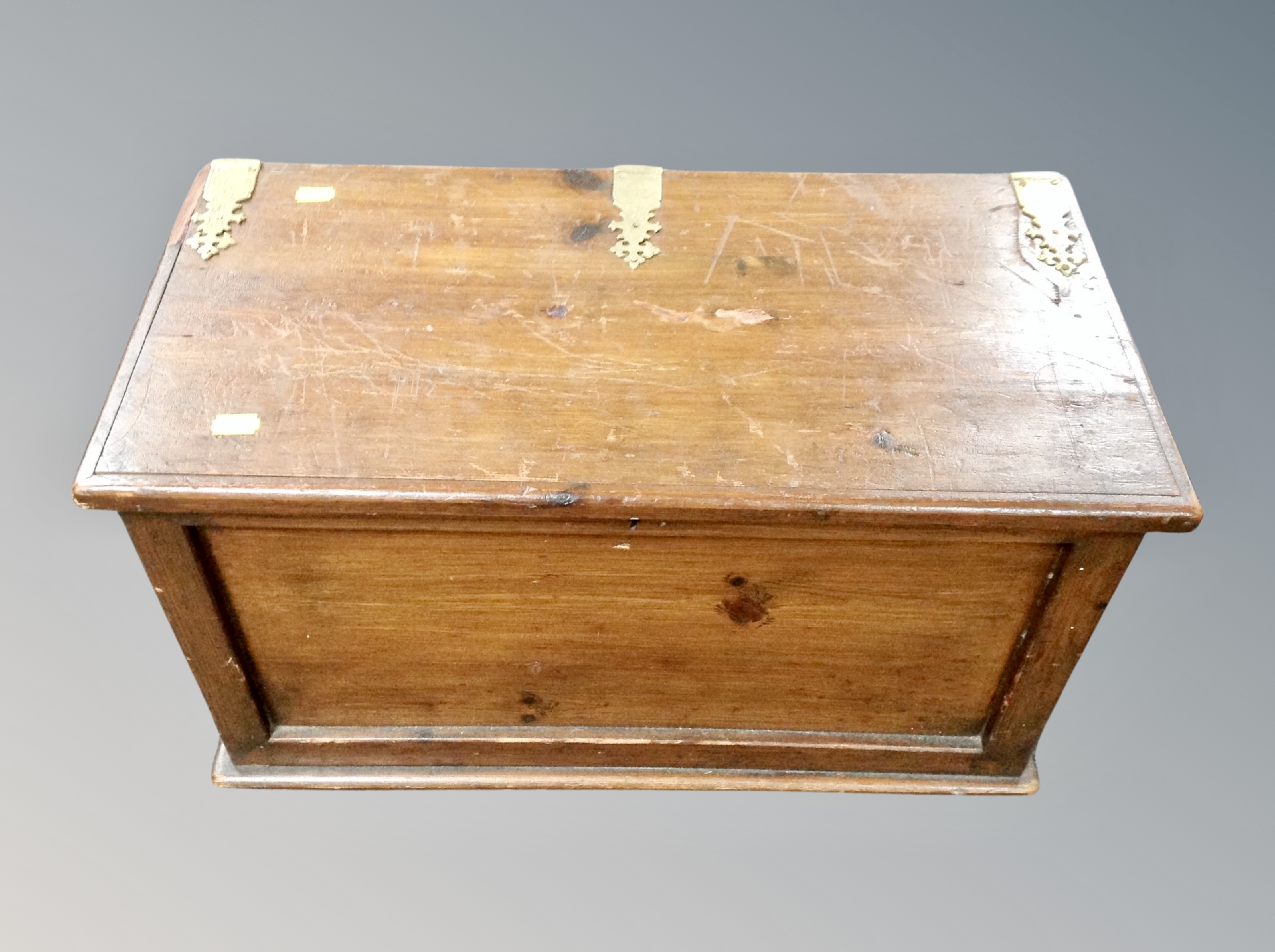 An antique stained pine sacrament box with key
