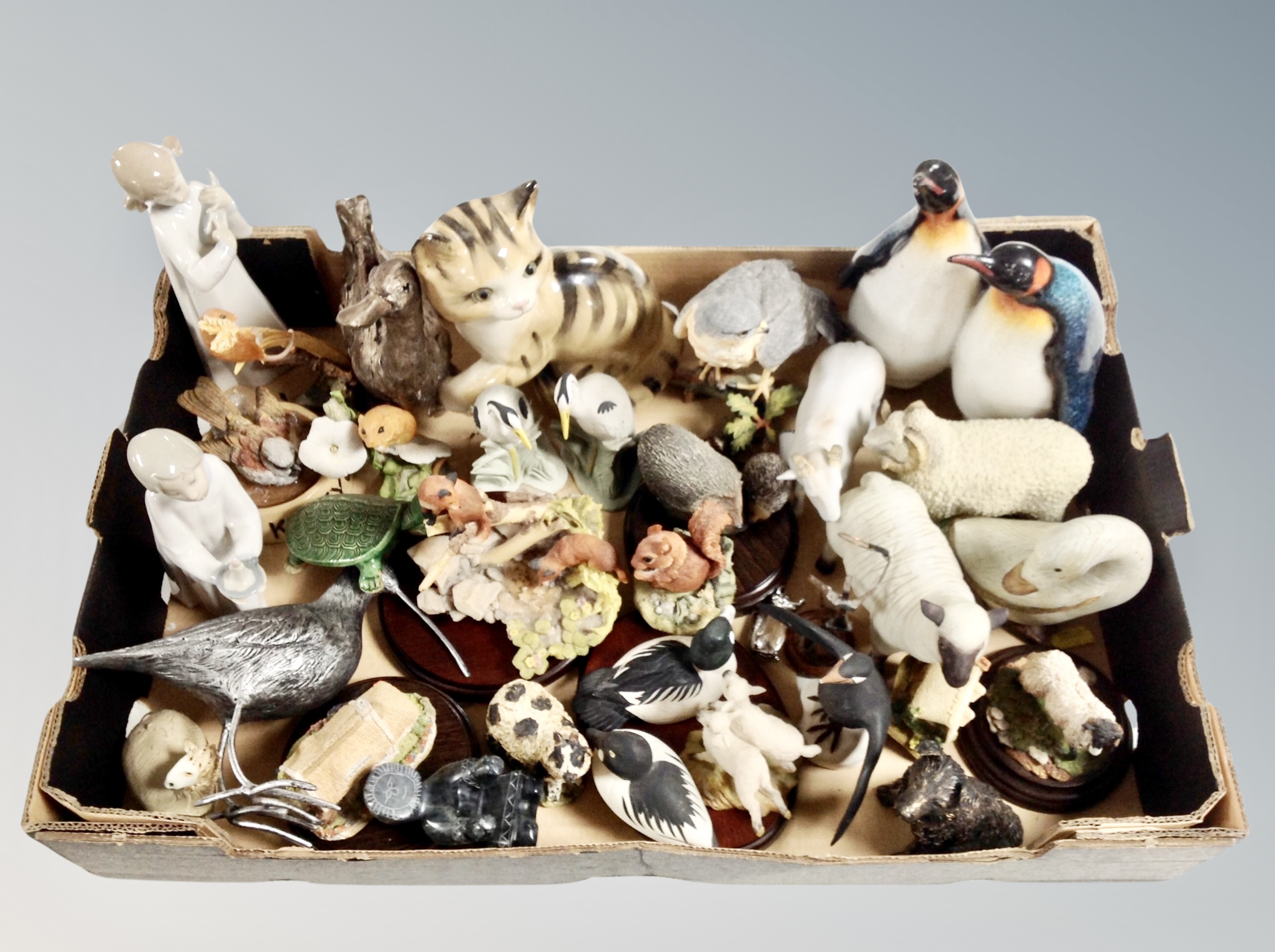 A box of animal ornaments, Lladro figure,