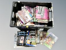 A crate of 1970's and later Newcastle United programmes