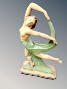 A 1930's chalk Art Deco dancer figure, stamped Rd. 84983 and NA 158, height 58cm.