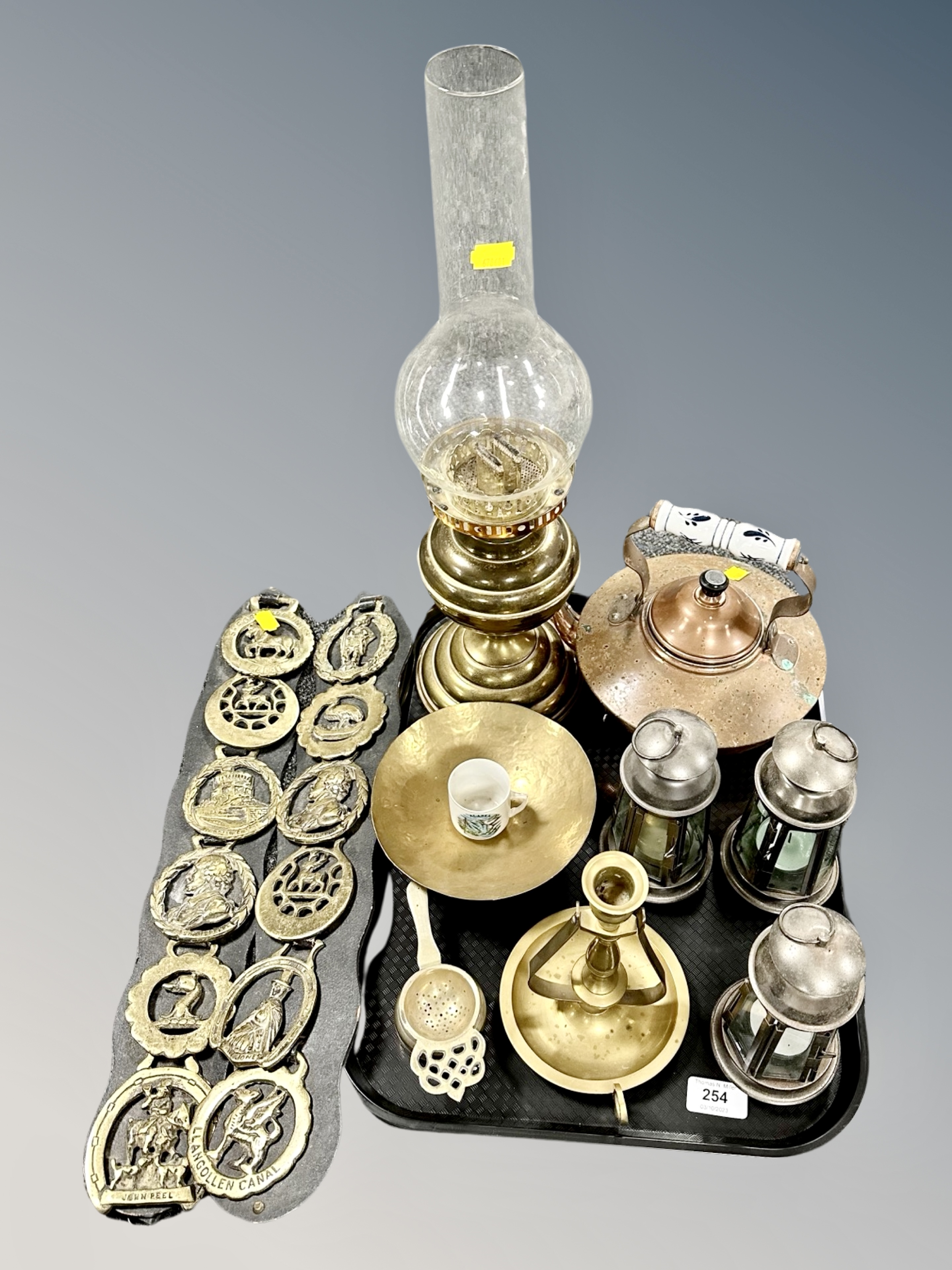 A tray of brass oil lamp, candlelight's,