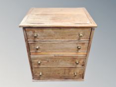 A Georgian oak commode chest