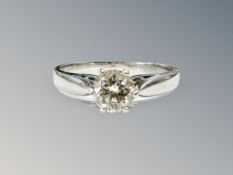 A platinum diamond solitaire ring, the brilliant-cut stone weighing approximately 0.