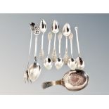 A collection of silver and white metal cutlery : caddy spoon,