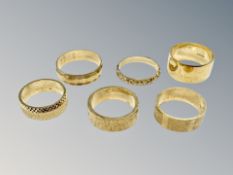 Six brass sample wedding bands