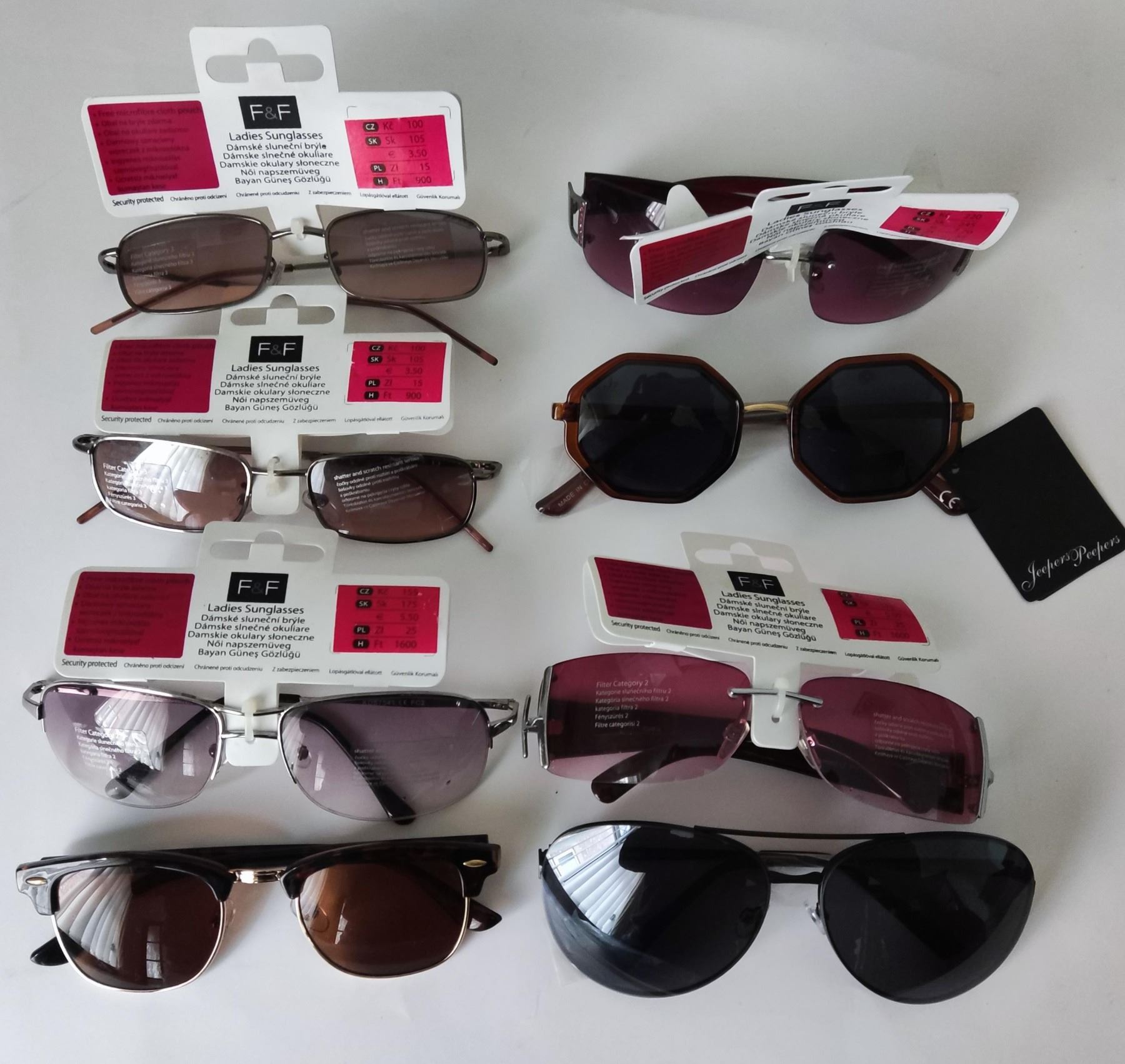 Eight pairs of F&F and Jeepers sunglasses,