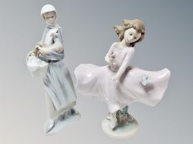 A Lladro figure of a lady with chicken,