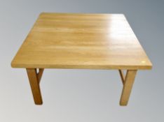 A square oak coffee table,