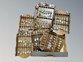 A large quantity of collector's spoons on racks