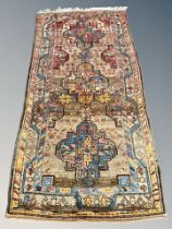 An Afghan/Caucasian long rug,