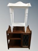 An oak low cabinet with leaded glass door together with painted pine washstand