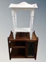 An oak low cabinet with leaded glass door together with painted pine washstand