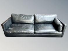 A Scandinavian black leather three seater settee (no legs),