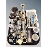 A tray of silver plated and other metal wares, set of six egg cups, two pairs of candlesticks,