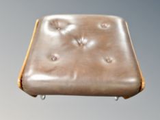 A G-Plan buttoned leather and teak storage footstool