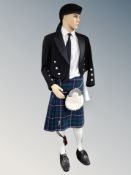 A mannequin in Scottish dress, kilt,
