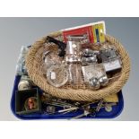 A quantity of vintage marbles, wicker basket containing glass paperweights, drawing utensils,