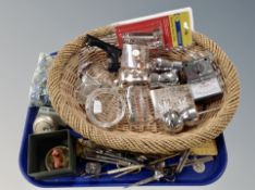 A quantity of vintage marbles, wicker basket containing glass paperweights, drawing utensils,