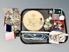 A collection of costume jewellery, cameo brooch in yellow metal mount, Festival of Britain coin,