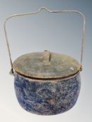 A 19th century cast iron Kenrick cooking pot