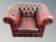 A Chesterfield oxblood leather club armchair