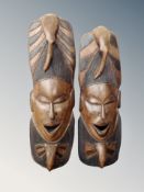 Two African carved hardwood masks,