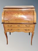 A reproduction French Kingwood veneered marquetry writing bureau,