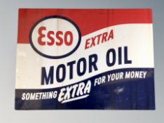 A reproduction Esso motor oil sign