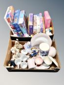 Two boxes of puzzles and jigsaws, figurines,