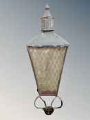 A wrought metal lantern,